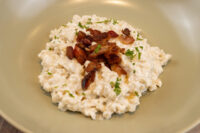 Bowl of Halušky with Bryndza Cheese Substitution topped with crispy browned bits and herbs