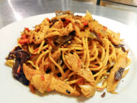 Plate of Lo Mein with Chicken: noodles, chicken strips, carrot slivers, and wood ear mushrooms.