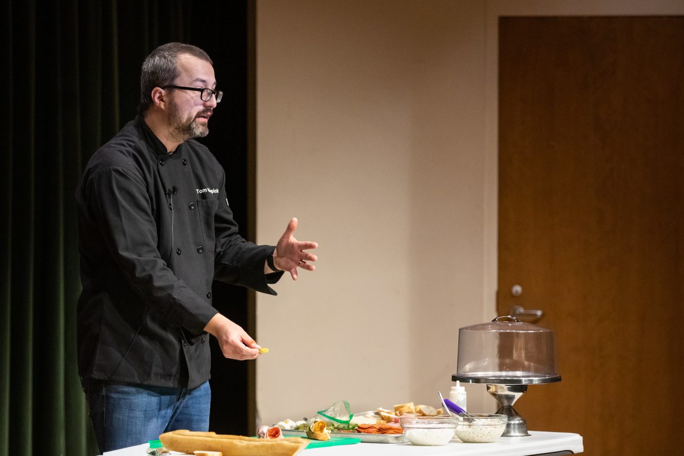 Tom Slepicka (aka Tom the Chef) is giving a lecture and showing food preparation at the same time at Missouri Southern State University in Joplin during Czech Semester 2022.